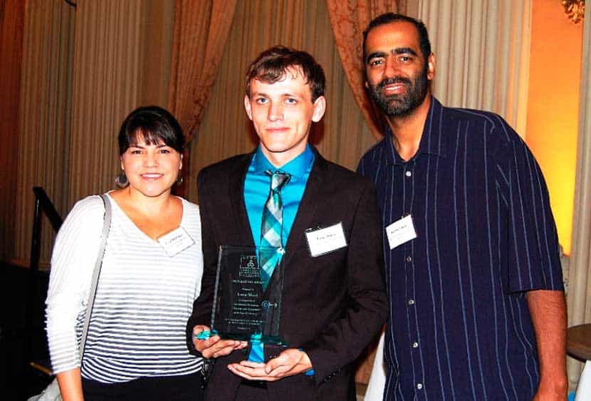 Lorne accepts the ACHSA's Inspiration Award with his former Star View counselors, Coral Huntsman and Kenny Langie.
