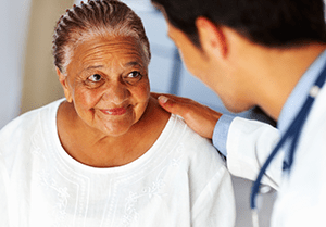 Elderly Woman with Therapist